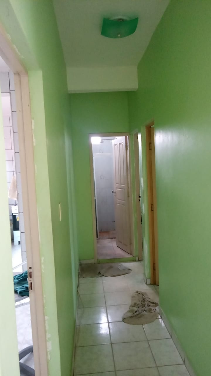 Corredor para cozinha quartos e banheiro